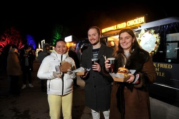 Some friends enjoying their street food at Winter Glow.