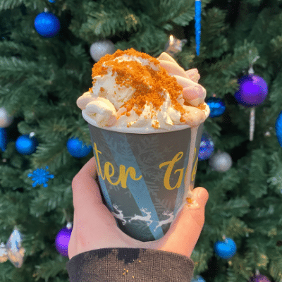 a special Winter Glow hot chocolate with the full works, including whipped cream and chocolate powder.